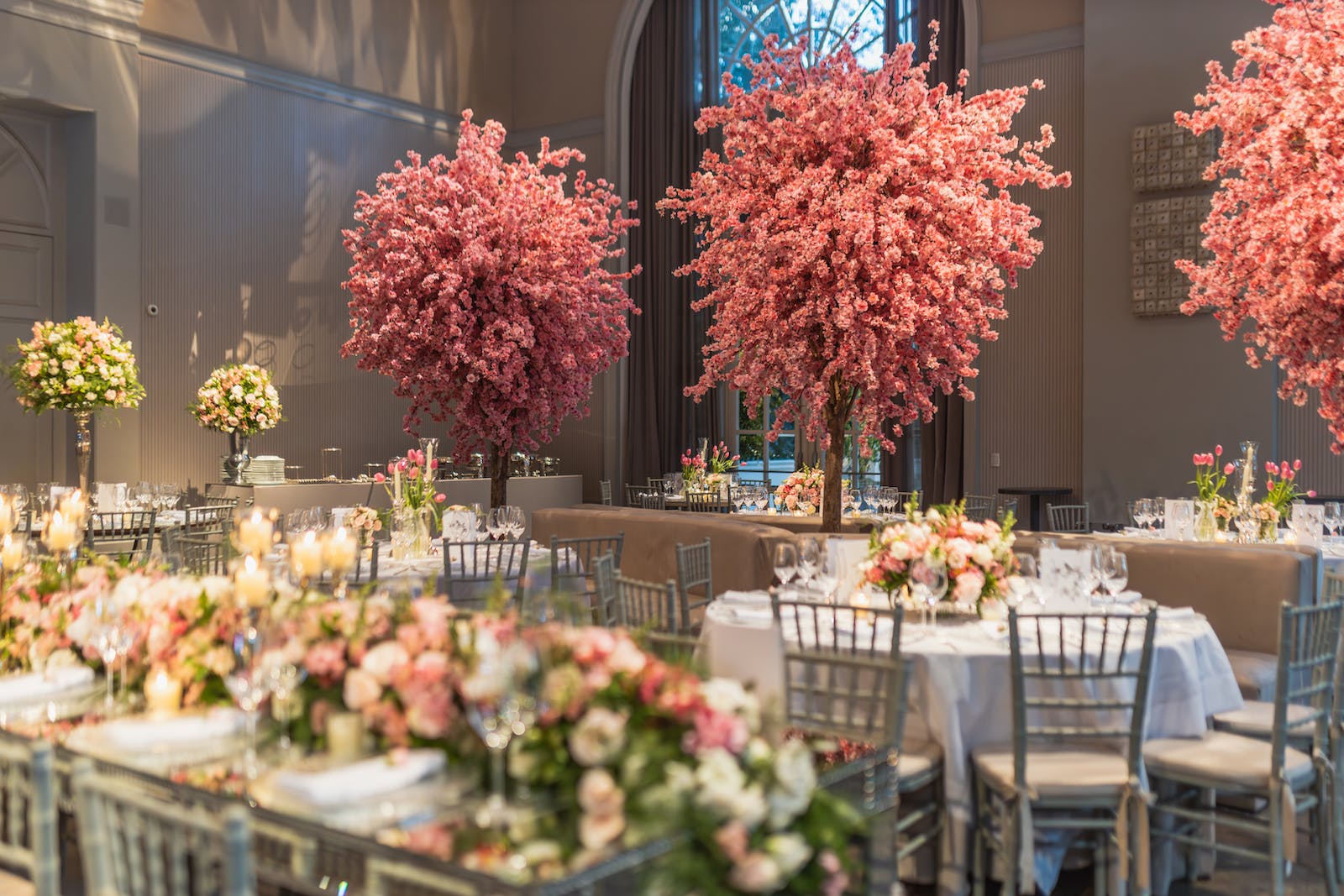 wedding venue decorated with flowers and trees